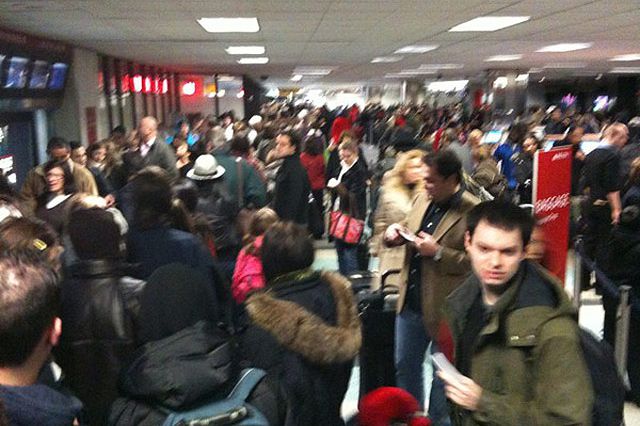 The scene at Delta's JFK terminal an hour ago, courtesy joelrclare's Twitter